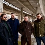 Članovi benda Echo Spiritus stoje ispod mosta Slobode u Novom Sadu